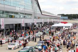 Fans look at the Super Touring cars