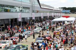 Fans look at the Super Touring cars