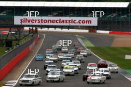 Silverstone Classic 2016,  29th-31st July, 2016, Silverstone Circuit, Northants, England.  Wolfe-Meaden 	Ford Lotus Cortina lead at the start  Copyright Free for editorial use only