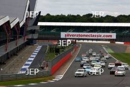 Silverstone Classic 2016,  29th-31st July, 2016, Silverstone Circuit, Northants, England.  Wolfe-Meaden 	Ford Lotus Cortina lead at the start  Copyright Free for editorial use only