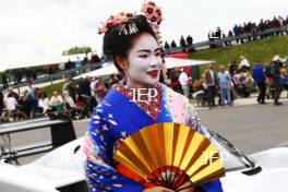 Silverstone Classic  28-30 July 2017  At the Home of British Motorsport  General A Geisha girl with the Sauber Mercedes C292 Free for editorial use only Photo credit – JEP