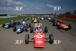 Silverstone Classic Media Day 2017, Silverstone Circuit, Northants, England. 23rd March 2017. Tiff Needell leads the Formula Ford field. Copyright Free for editorial use.