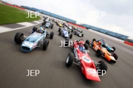 Silverstone Classic Media Day 2017, Silverstone Circuit, Northants, England. 23rd March 2017. Tiff Needell leads the Formula Ford field. Copyright Free for editorial use.