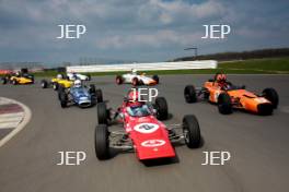 Silverstone Classic Media Day 2017, Silverstone Circuit, Northants, England. 23rd March 2017. Tiff Needell leads the Formula Ford field. Copyright Free for editorial use.