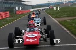 Silverstone Classic Media Day 2017, Silverstone Circuit, Northants, England. 23rd March 2017. Tiff Needell leads the Formula Ford field. Copyright Free for editorial use.