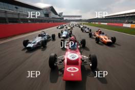 Silverstone Classic Media Day 2017, Silverstone Circuit, Northants, England. 23rd March 2017. Tiff Needell leads the Formula Ford field. Copyright Free for editorial use.