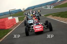 Silverstone Classic Media Day 2017, Silverstone Circuit, Northants, England. 23rd March 2017. Tiff Needell leads the Formula Ford field. Copyright Free for editorial use.