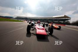 Silverstone Classic Media Day 2017, Silverstone Circuit, Northants, England. 23rd March 2017. Tiff Needell leads the Formula Ford field. Copyright Free for editorial use.