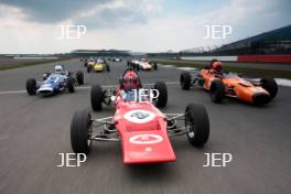 Silverstone Classic Media Day 2017, Silverstone Circuit, Northants, England. 23rd March 2017. Tiff Needell leads the Formula Ford field. Copyright Free for editorial use.