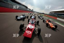 Silverstone Classic Media Day 2017, Silverstone Circuit, Northants, England. 23rd March 2017. Tiff Needell leads the Formula Ford field. Copyright Free for editorial use.