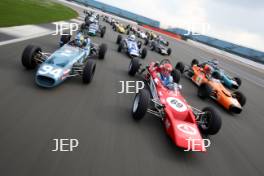 Silverstone Classic Media Day 2017, Silverstone Circuit, Northants, England. 23rd March 2017. Tiff Needell leads the Formula Ford field. Copyright Free for editorial use.