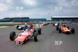 Silverstone Classic Media Day 2017, Silverstone Circuit, Northants, England. 23rd March 2017. Tiff Needell leads the Formula Ford field. Copyright Free for editorial use.