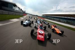 Silverstone Classic Media Day 2017, Silverstone Circuit, Northants, England. 23rd March 2017. Tiff Needell leads the Formula Ford field. Copyright Free for editorial use.