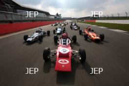 Silverstone Classic Media Day 2017, Silverstone Circuit, Northants, England. 23rd March 2017. Tiff Needell leads the Formula Ford field. Copyright Free for editorial use.