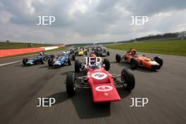 Silverstone Classic Media Day 2017, Silverstone Circuit, Northants, England. 23rd March 2017. Tiff Needell leads the Formula Ford field. Copyright Free for editorial use.