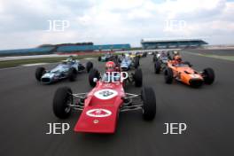 Silverstone Classic Media Day 2017, Silverstone Circuit, Northants, England. 23rd March 2017. Tiff Needell leads the Formula Ford field. Copyright Free for editorial use.