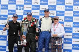 Silverstone Classic 2019 Podium, Steve Hartlet and Mike Cantillon with Sir Jackie Stewart At the Home of British Motorsport. 26-28 July 2019 Free for editorial use only  Photo credit – JEP 