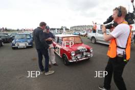 Silverstone Classic 2019 Mini Anniversary Parade Paddy Hopkirk at the Home of British Motorsport. 26-28 July 2019 Free for editorial use only  Photo credit – JEP