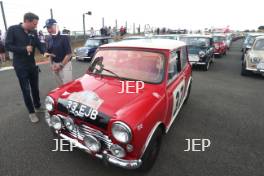 Silverstone Classic 2019 Mini Anniversary Parade Paddy Hopkirk at the Home of British Motorsport. 26-28 July 2019 Free for editorial use only  Photo credit – JEP