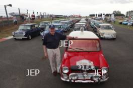 Silverstone Classic 2019 Mini Anniversary Parade Paddy Hopkirk at the Home of British Motorsport. 26-28 July 2019 Free for editorial use only  Photo credit – JEP