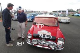 Silverstone Classic 2019 Mini Anniversary Parade Paddy Hopkirk at the Home of British Motorsport. 26-28 July 2019 Free for editorial use only  Photo credit – JEP