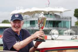 Silverstone Classic 2019 Mini Anniversary Parade Paddy Hopkirk at the Home of British Motorsport. 26-28 July 2019 Free for editorial use only  Photo credit – JEP