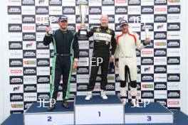 Silverstone Festival, Silverstone 2023 25th-27th August 2023 Free for editorial use only  Podium (l-r) 72 Matthew Wrigley - Penske PC3, 6 Nick Padmore - Lotus 77, 21 Maximilian Werner - Hesketh 308C