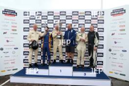 Silverstone Festival, Silverstone 2023 25th-27th August 2023 Free for editorial use only Podium (l-r) 10 Malcolm Paul / Will Nuthall - Lotus MkX, 17 John Pearson / Gary Pearson - Jaguar D-type, 450 Paul Mortimer / Jonathan Mortimer - Austin-Healey