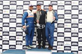 Silverstone Festival, Silverstone 2024, 23rd-25th August 2024. Free for editorial use only Race 2 Podium (l-r) 18 Stuart Hall - March 821, 72 Matthew Wrigley - Tyrrell 011, 7 Mike Cantillon - Williams FW07C  